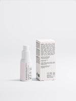 Targeted Dark Spot Care 1% Kojic Acid pump bottle and ingredient label box display on a clean background