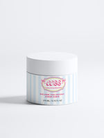 Icelandic Volcano Face and Body Scrub jar in white with light blue stripes and pink logo on a white background