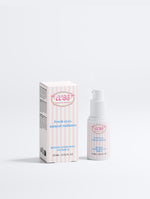 A bottle of COBB Retinal Alternative eye drops next to its matching pink and white striped box, set against a clean white background.