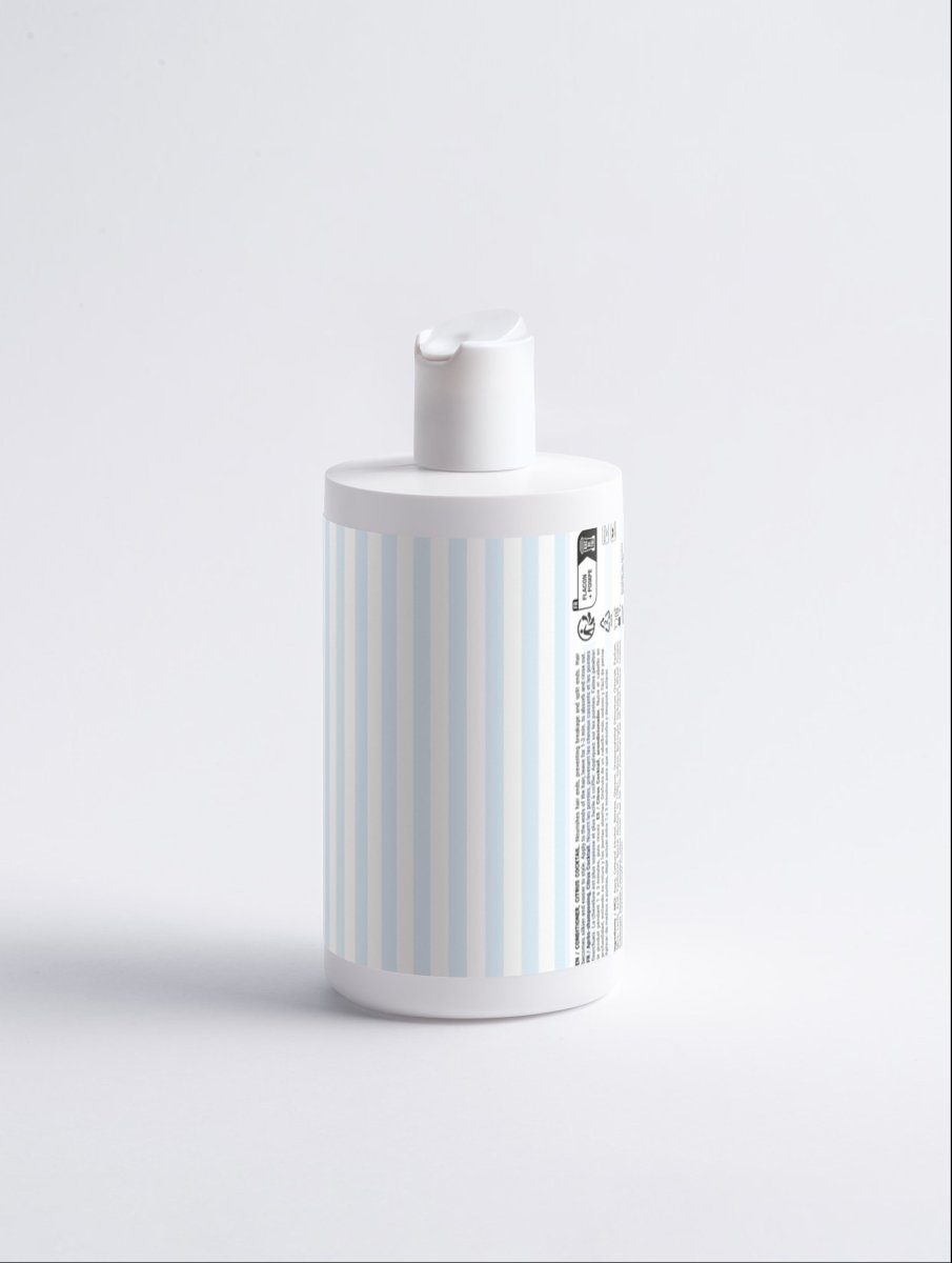 Fresh Conditioner Citrus Cocktail white bottle with blue and white striped label on a white background