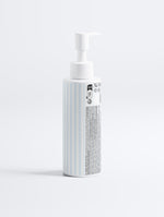 Side angle view of the Blemish Purifying Face Wash pump bottle packaging