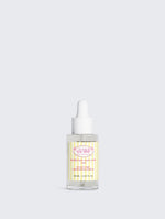 Nourishing scalp treatment bottle side view for healthy hair roots