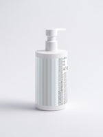 A white pump bottle with a vertical light blue and white stripe pattern on its label, shown on a clean white background.