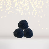 black fuzzy snowballs